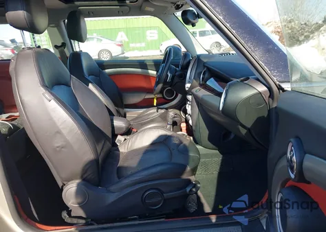 2009 Mini Cooper S z USA, uszkodzony, nr VIN WMWMF735X9TW87772